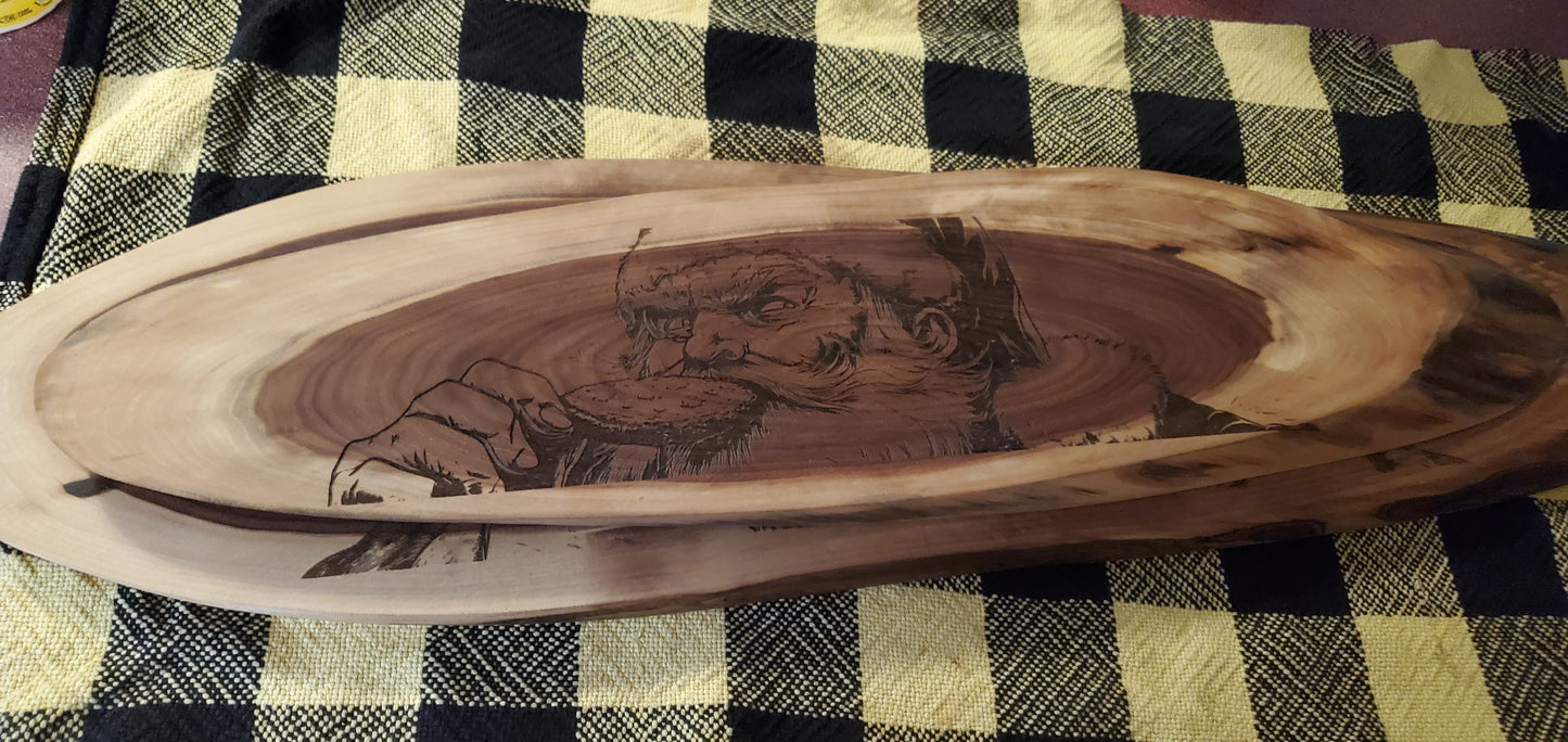Wooden tray with engraved design of Santa eating a cookie