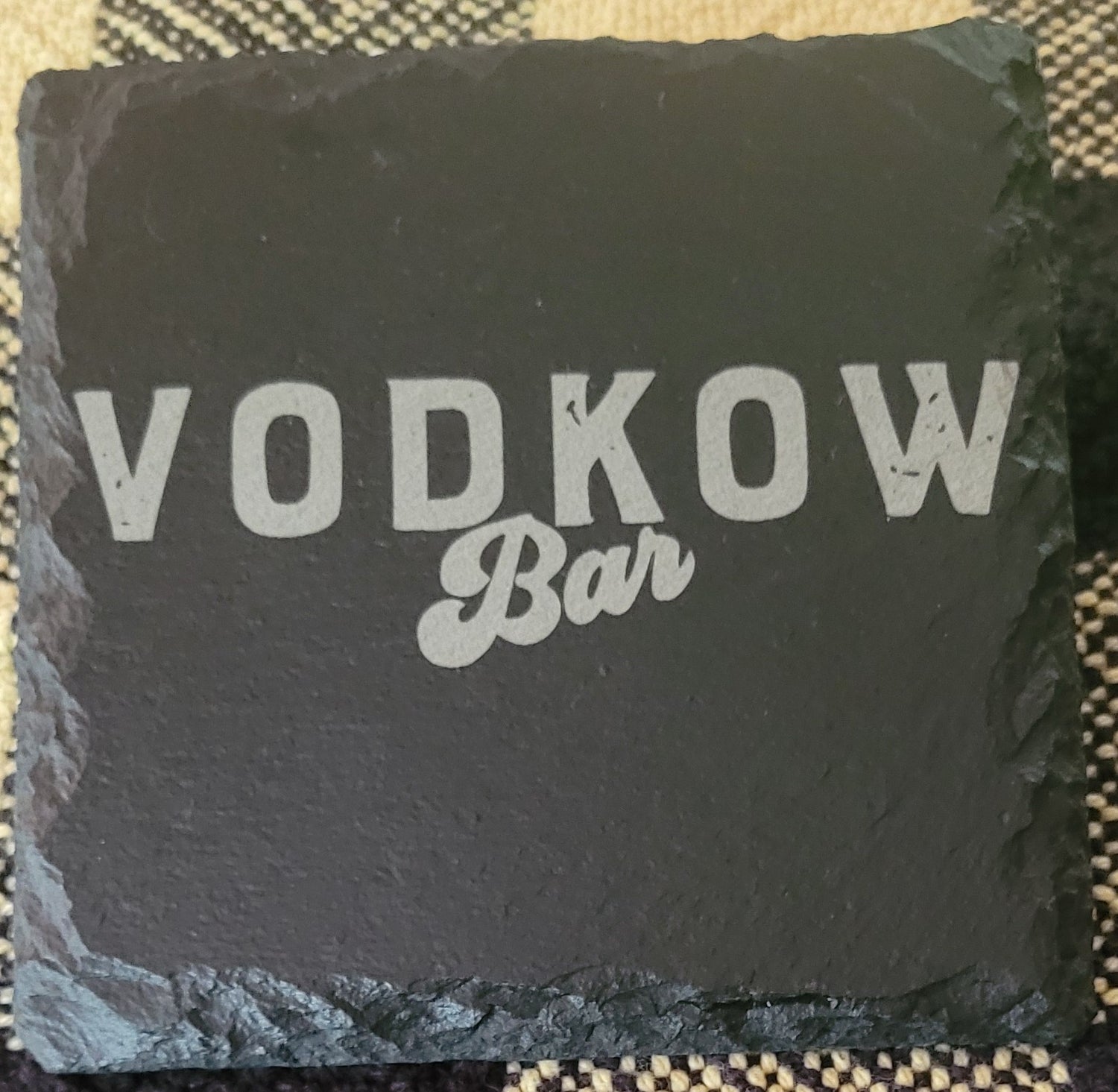 Slate coaster with 'VODKOW Bar' engraving