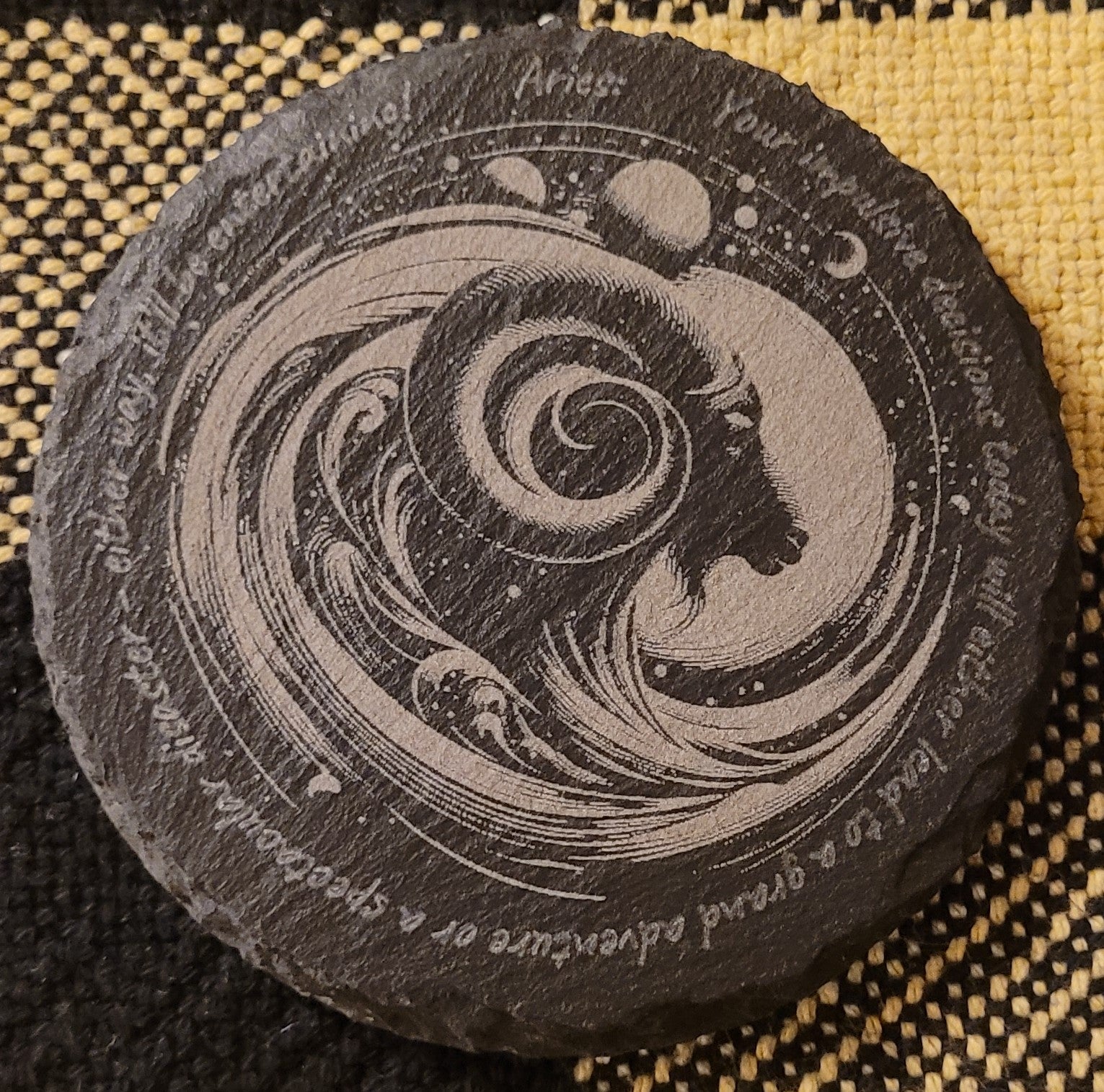 Decorative stone with engraved design and text