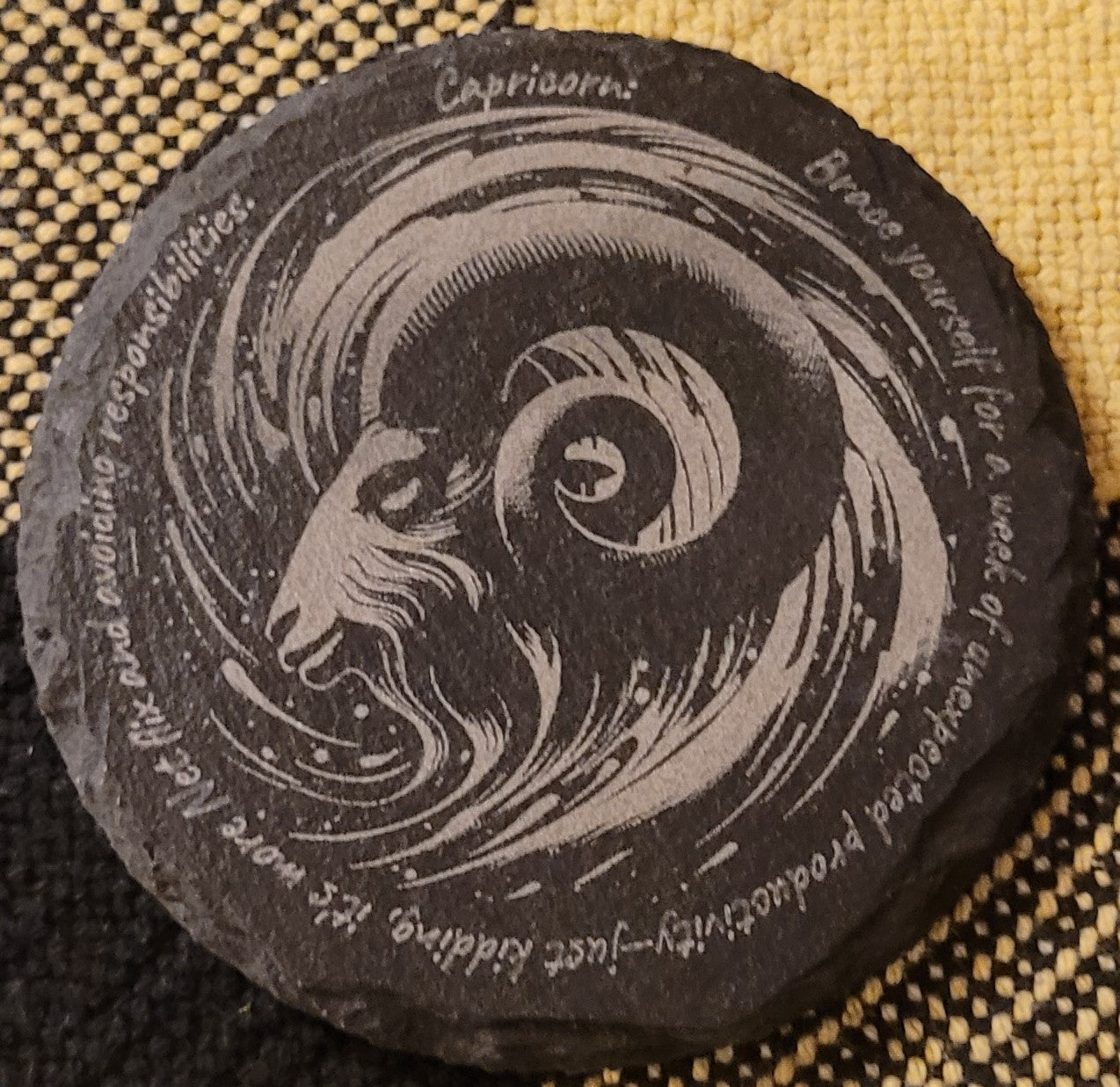 Decorative stone with Capricorn zodiac design