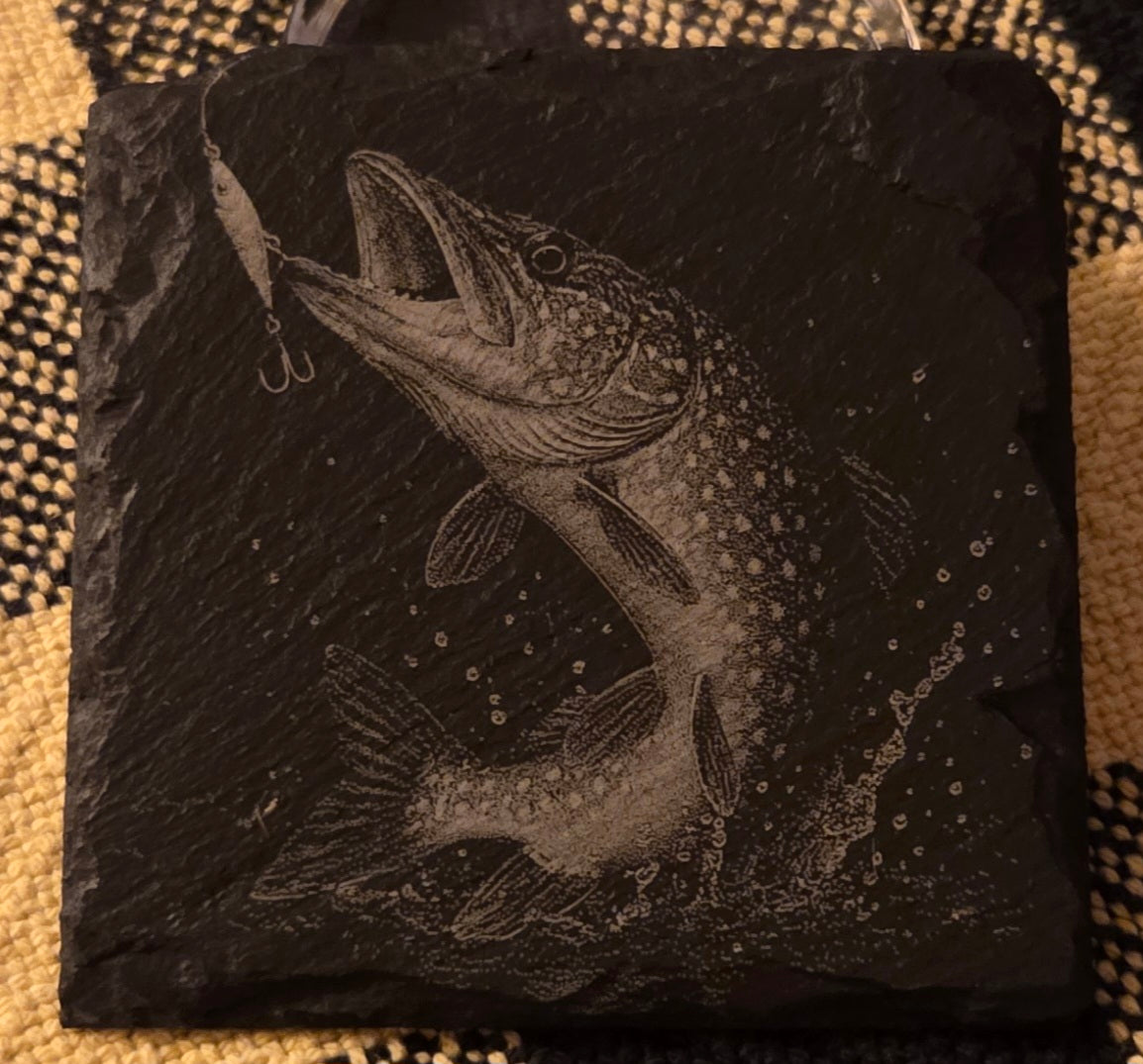 Slate coaster with engraved fish design