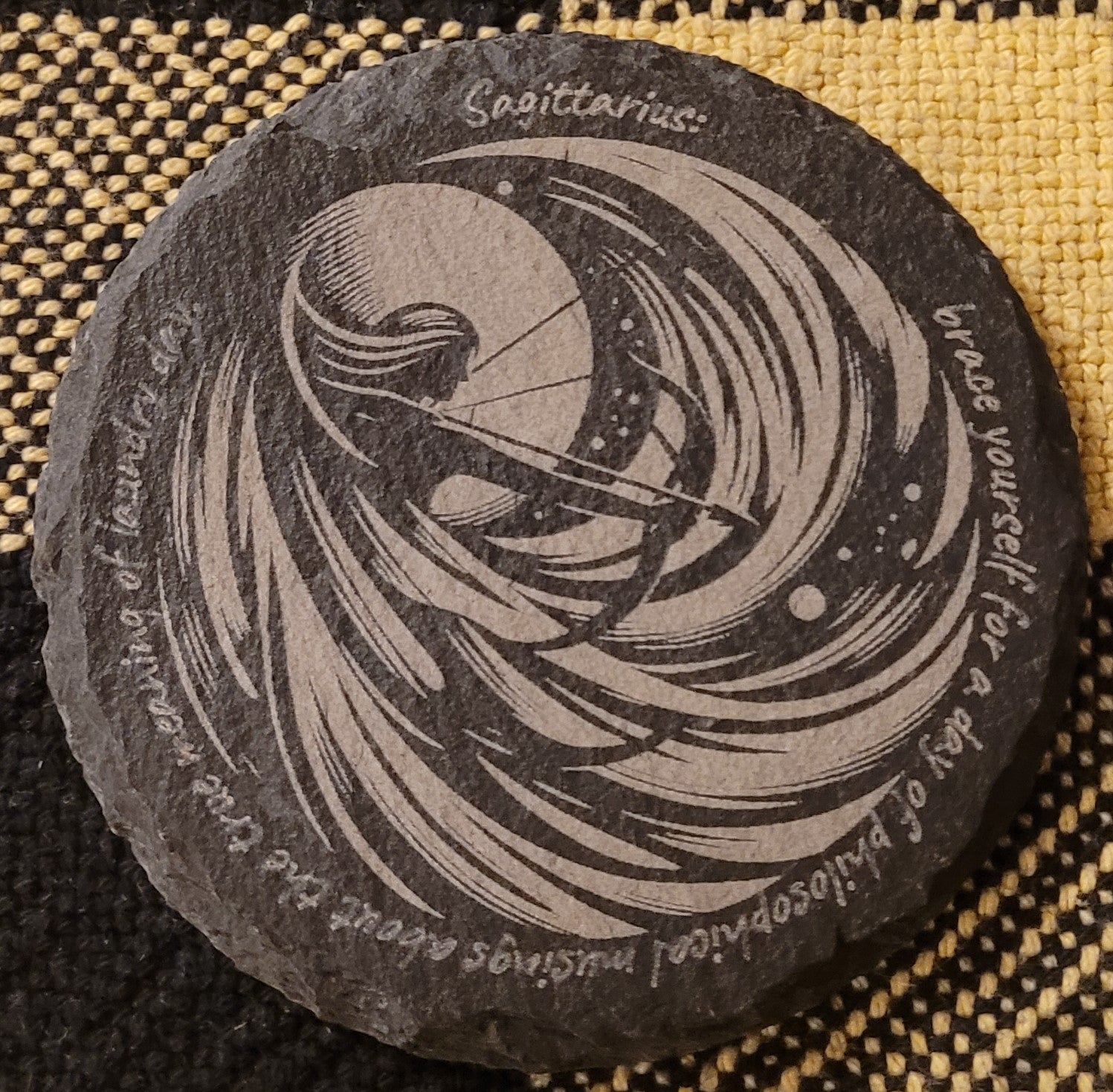 Decorative stone with engraved design and text